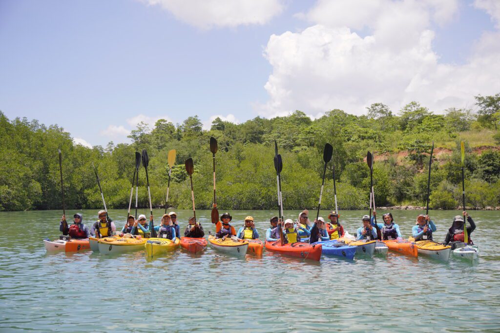 Kayakers completing professional sea kayak training in Komodo National Park