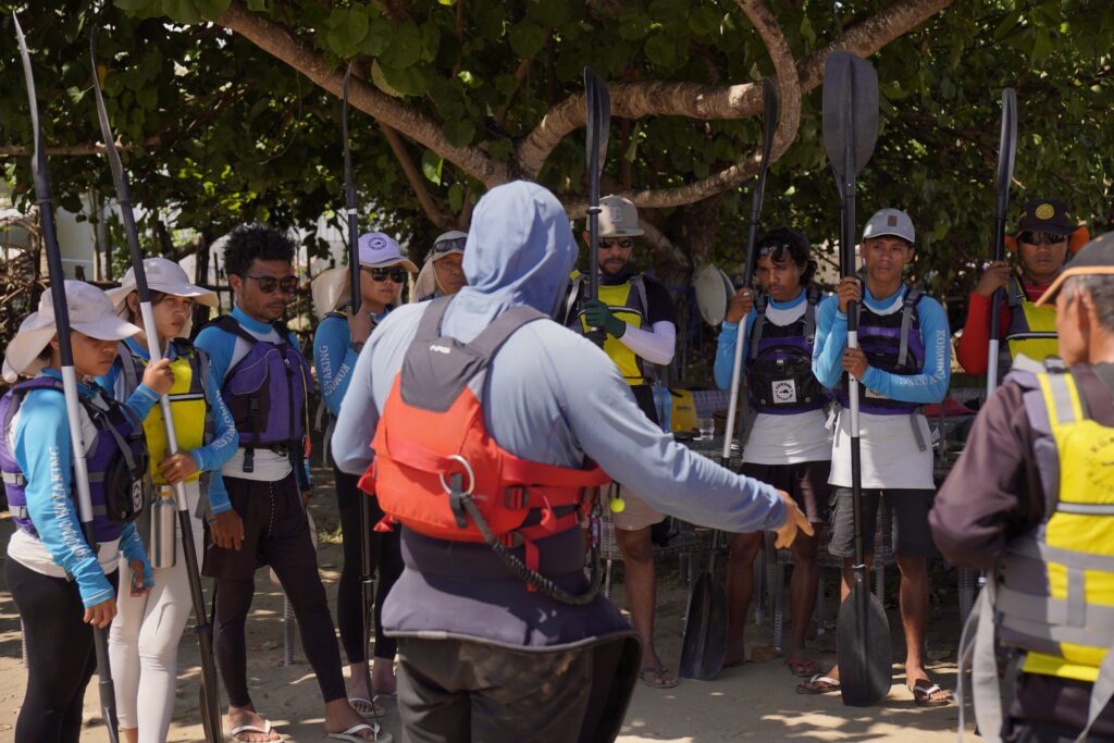 Certified instructor teaching beginner kayak training in Labuan Bajo, Indonesia